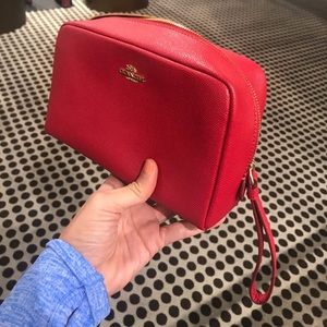 Red brand new make up bag by coach